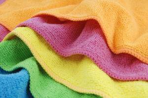 Microfiber cleaning cloths come in various colors to help with contamination control